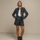 Blazer bouclé corto con bottoni gioiello