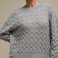 Maglione donna in maglia a trecce con filo luminoso