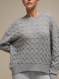 Maglione donna in maglia a trecce con filo luminoso