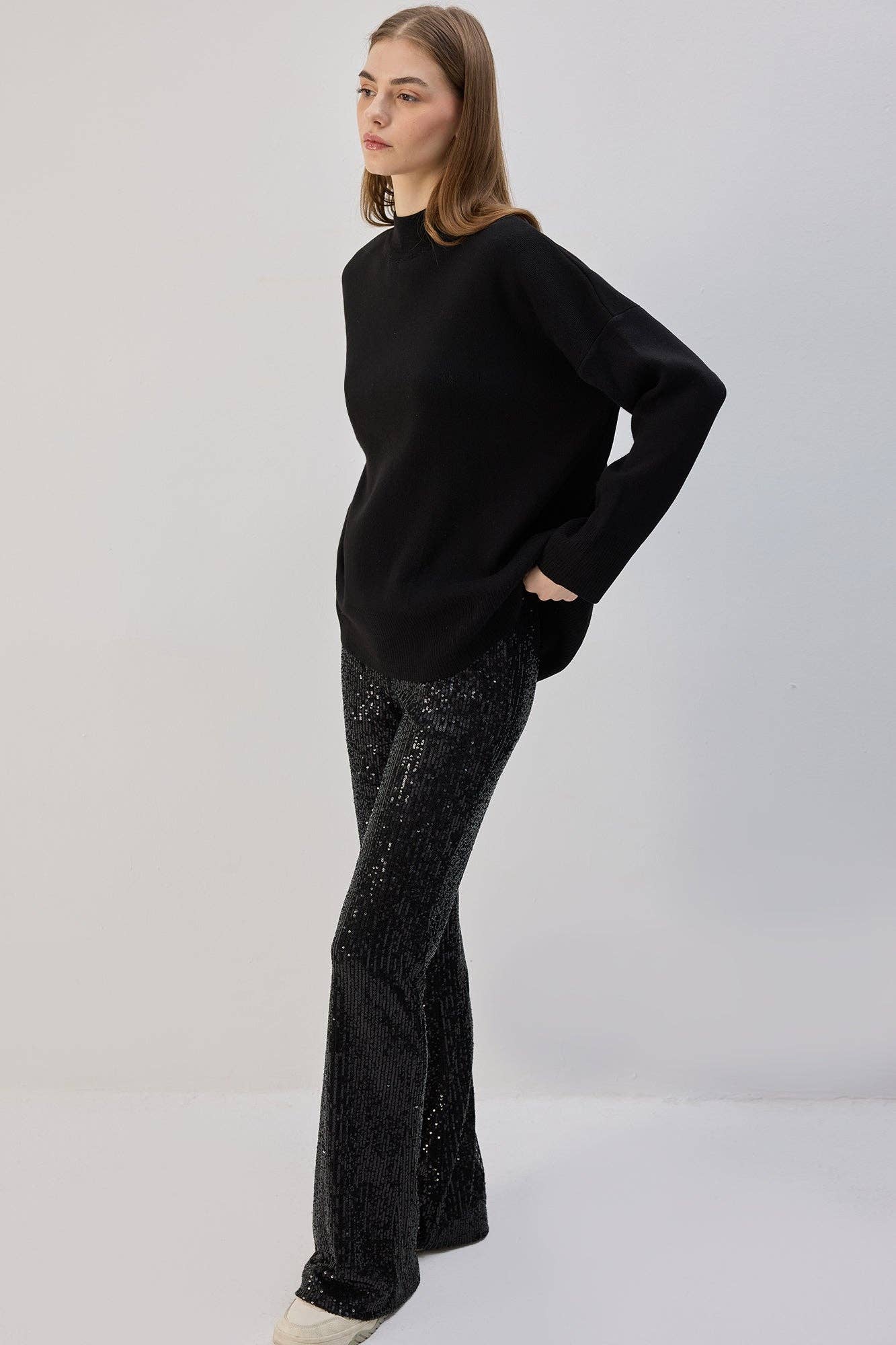Pantaloni a zampa con paillettes