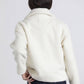 Cappotto corto teddy con chiusure a gancio