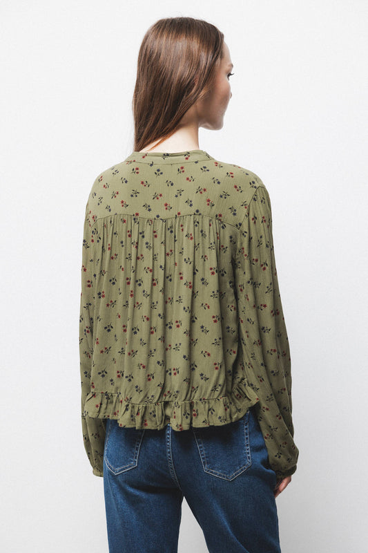 Blusa floreale con bottoni e maniche a palloncino