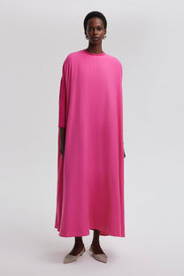 Abito oversize con body fucsia