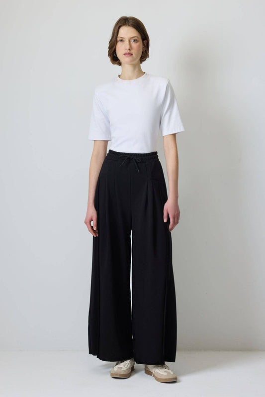 Pantaloni a palazzo con pieghe e coulisse