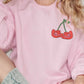Felpa oversize con stampa ciliegie