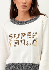 Maglia in cotone con paillettes e scritta