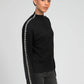 Maglione dolcevita nero Nissya con cuciture a contrasto