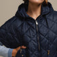 Capa donna trapuntata in nylon con cappuccio
