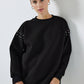 Felpa oversize con dettagli gioiello sulle maniche