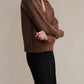 Polo oversize in tweed con tasche
