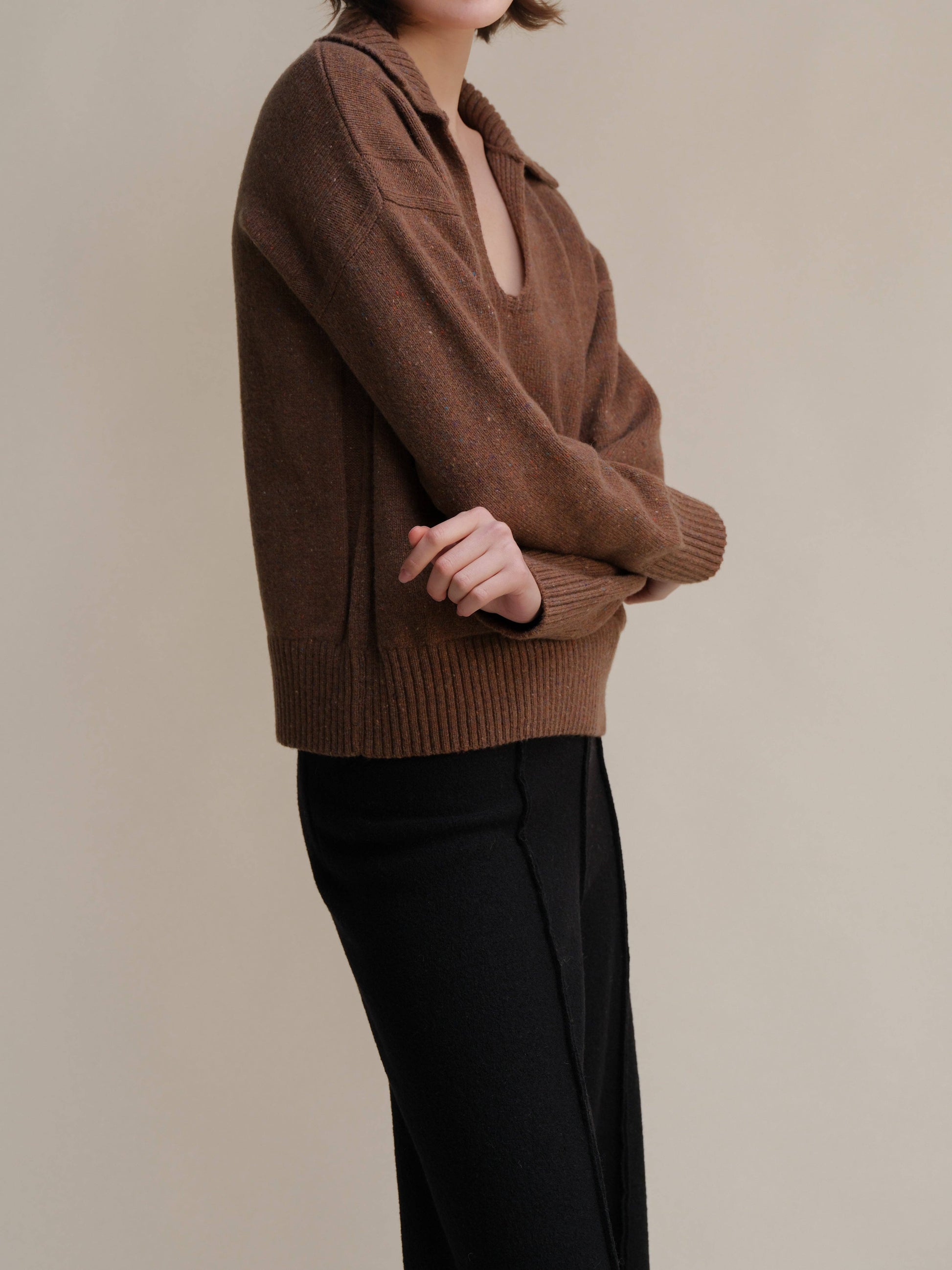 Polo oversize in tweed con tasche