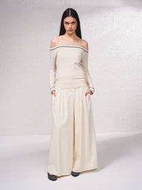 Maglione off-shoulder in lurex con profili a contrasto