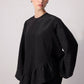 Blusa nera con balza asimmetrica