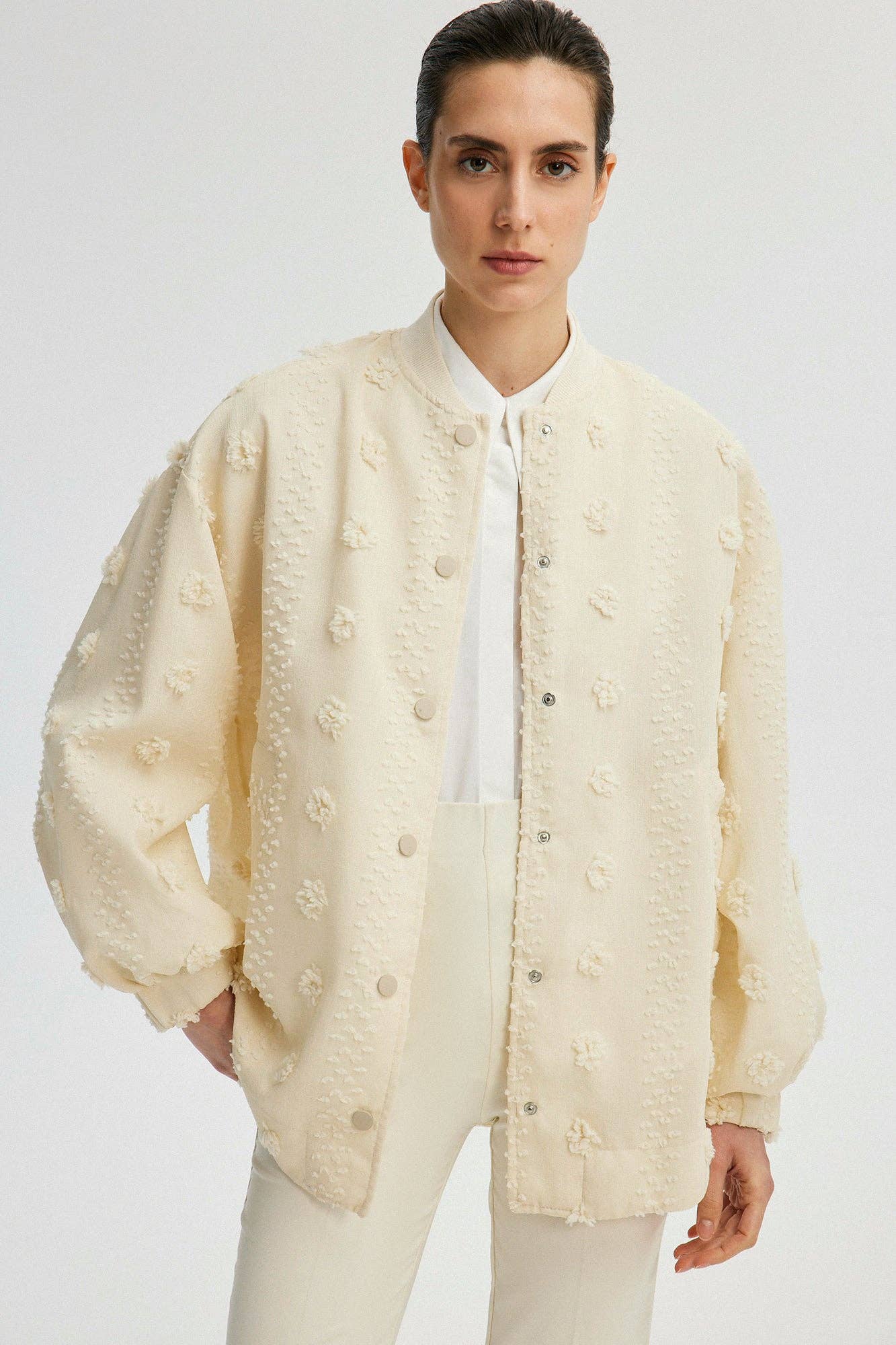 Bomber in pizzo floreale ecrù