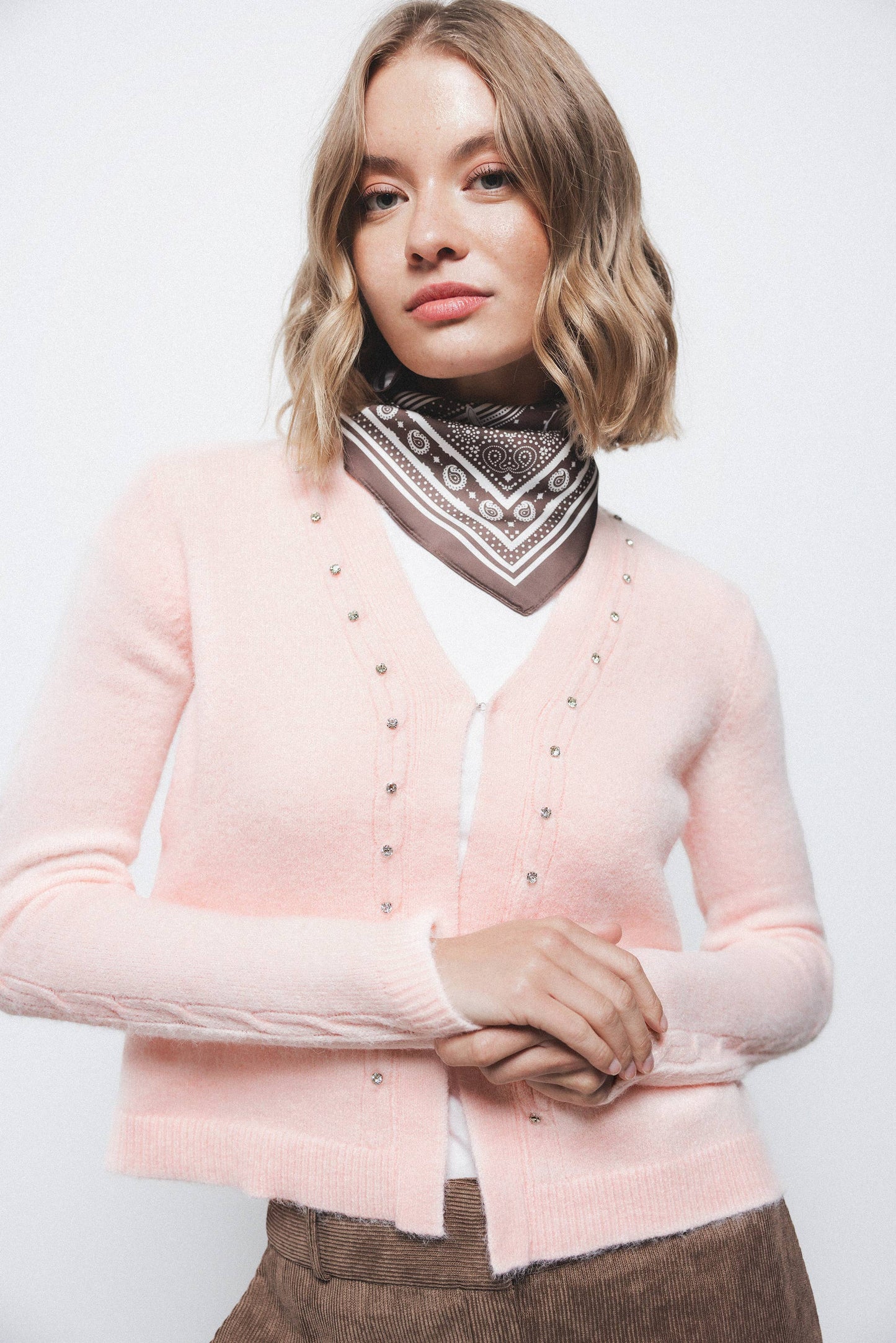 Giacca in maglia con pietre a contrasto