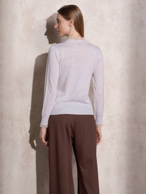 Maglione in maglia con collo alto e volant