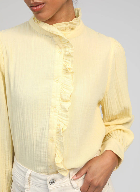 Camicia con rouches e collo alto