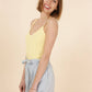Top Maisy in cotone con spalline sottili e scollo a V