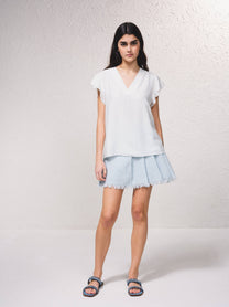 Blusa fluida con scollo a V e maniche arricciate