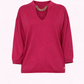 Maglia morbida con scollo a V e dettaglio catena
