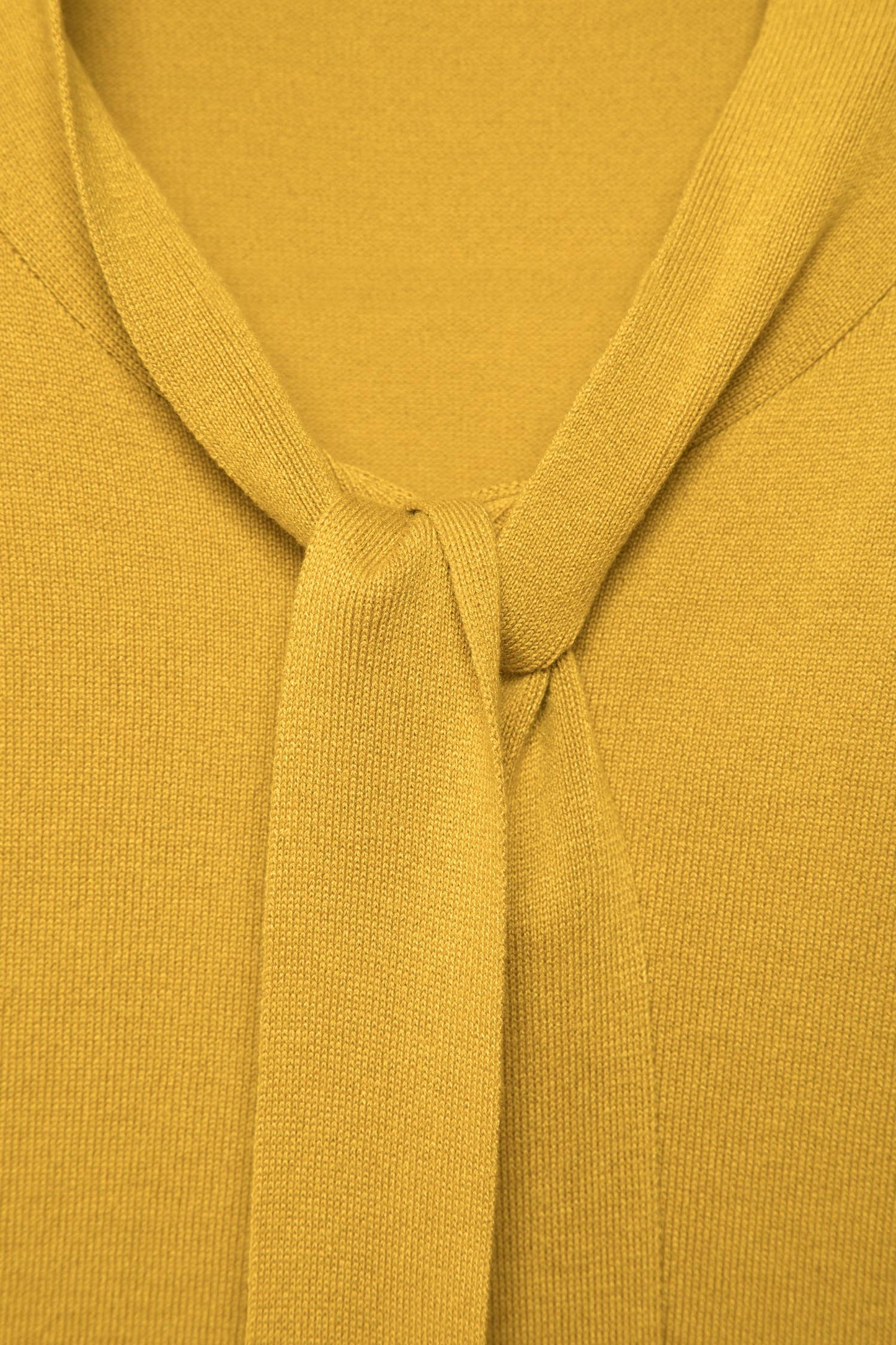 Maglione in maglia rasata con scollo a V e fiocco