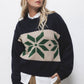 Maglione jacquard con maniche a palloncino