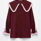Camicia bordeaux con maxi colletto a contrasto e volant