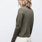 Maglione in maglia rasata con scollo a V e fiocco