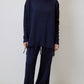 Set maglia e pantaloni con frange