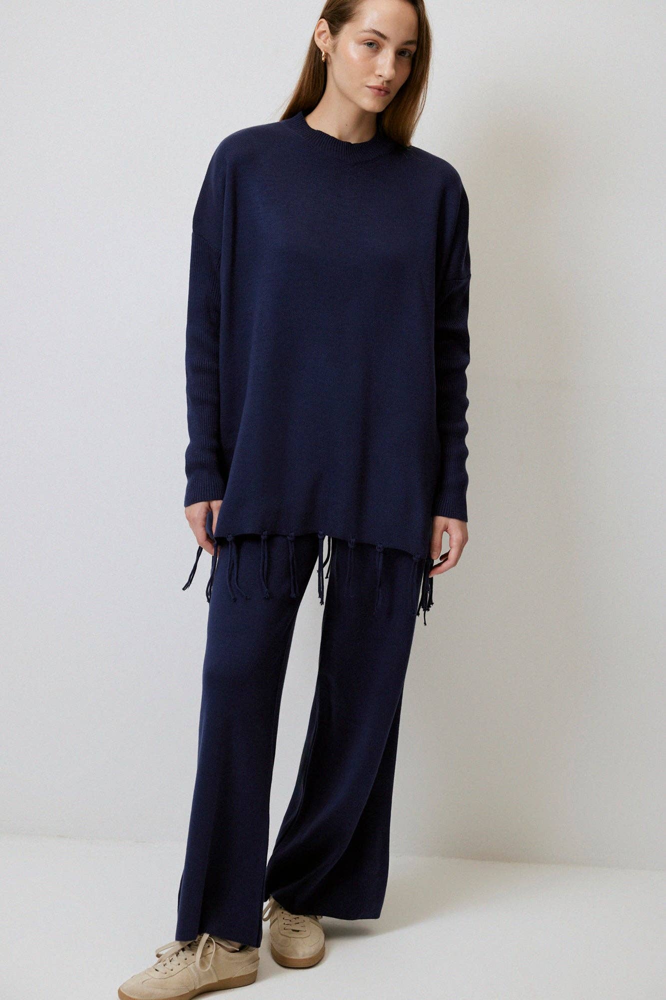 Set maglia e pantaloni con frange