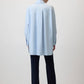 Camicia oversize azzurra con bottoni in metallo