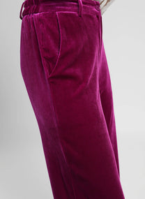 Pantaloni a zampa in velluto viola