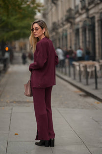 Pantaloni in maglia a coste con spacchi laterali