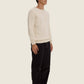 Maglione in maglia bianco neve in cotone organico