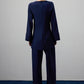 Camicetta drappeggiata blu navy con accessorio in metallo