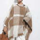 Poncho a quadri con frange
