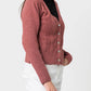 Cardigan in maglia a trecce con bottoni