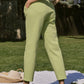 Pantaloni con pinces in cotone stretch a vita alta