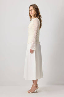 Camicetta romantica in pizzo con bottoni e maniche in organza