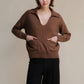 Polo oversize in tweed con tasche