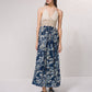 Abito lungo boho con top all’uncinetto e gonna floreale