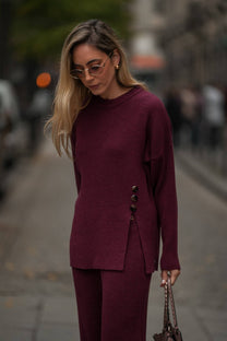 Maglia in maglia con bottoni laterali