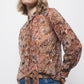 Blusa semitrasparente fantasia con fiocco al collo