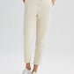 Pantaloni in denim carrot fit crema