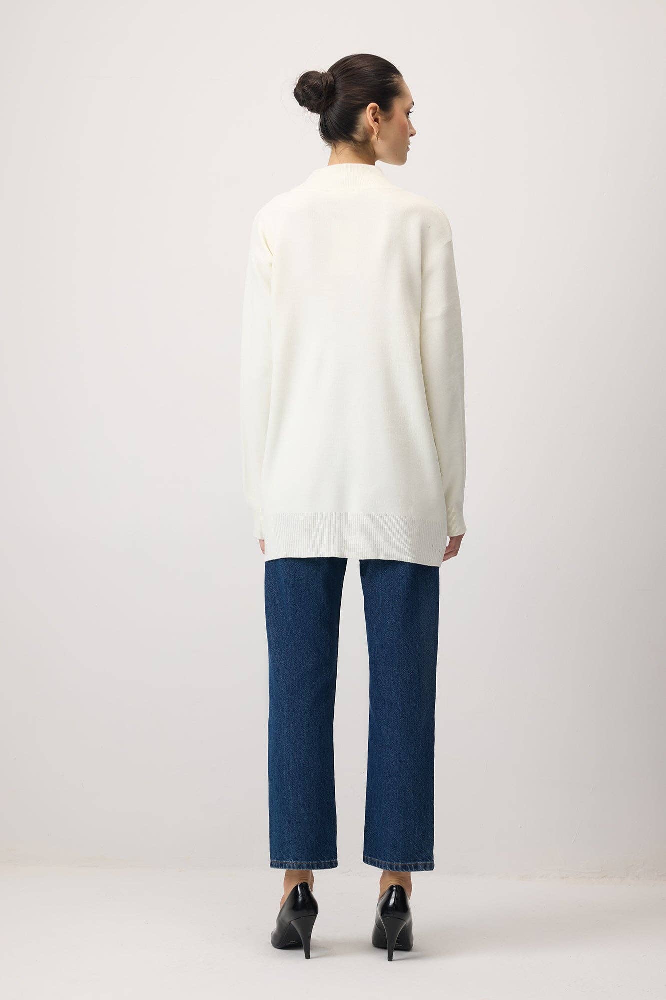 Tunica in maglia con accessorio metallico