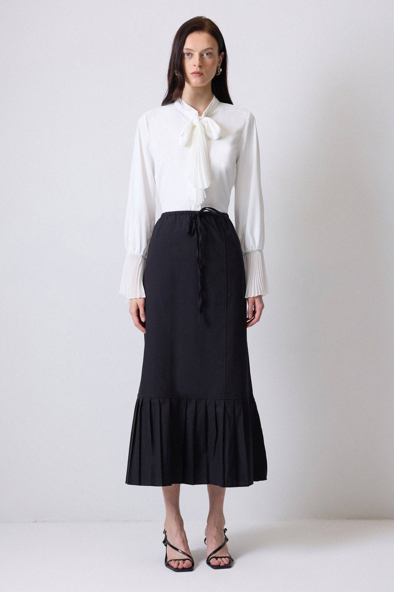 Gonna longuette plissettata con vita elasticizzata