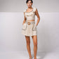 Top crop aderente con volant