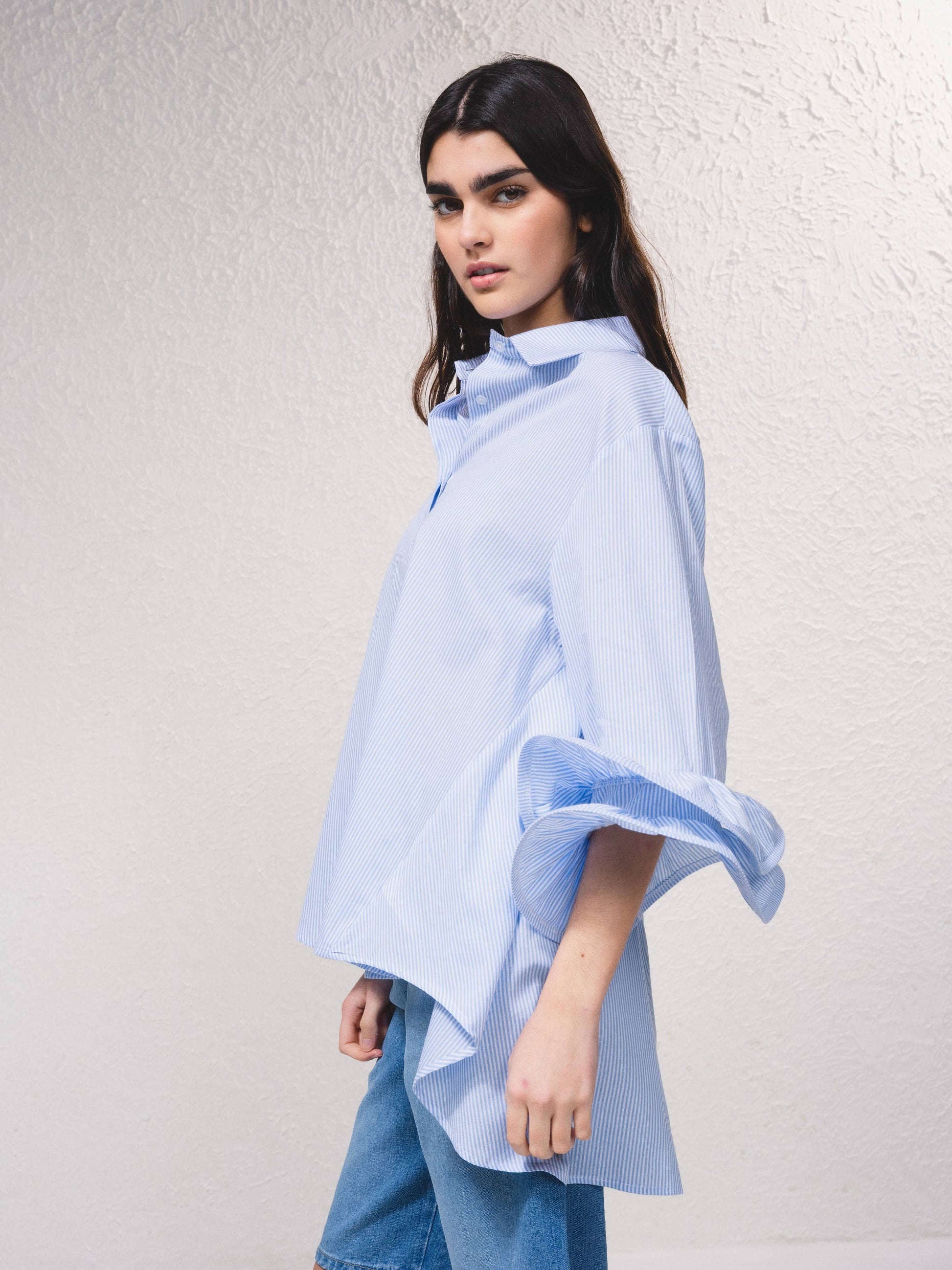 Blusa a righe con volant rinforzati