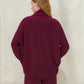 Maglione lungo dolcevita in misto cashmere con lavorazione 3D