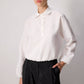 Blusa con bottoni sul davanti e orlo elasticizzato